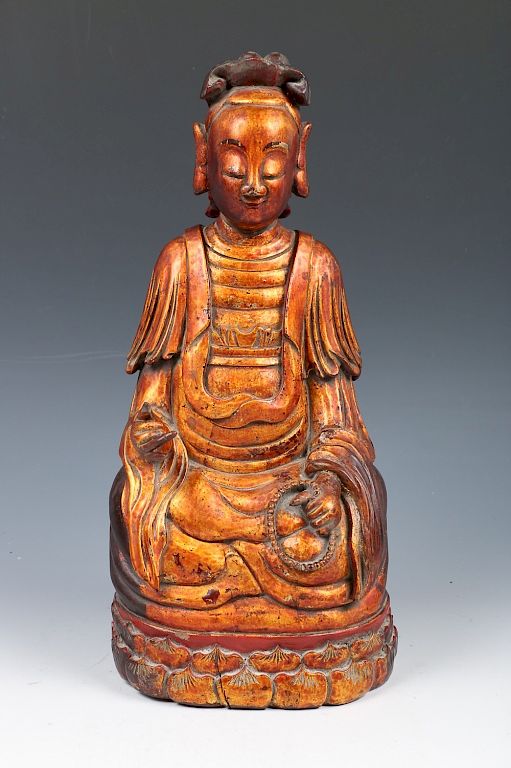 Appraisal: GILT-LACQUERED BUDDHA FIGURE Seated Buddha with detachable right hand curling