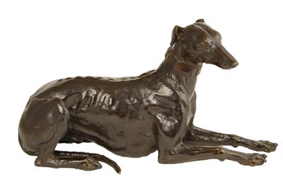 Appraisal: A bronze model of a reclining greyhound th century in