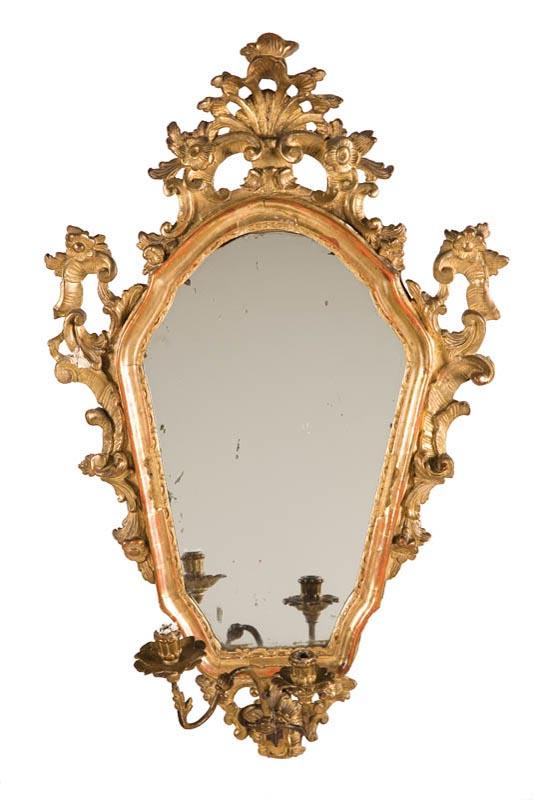 Appraisal: CARVED AND GILT MIRROR Late th-early th century softwood In