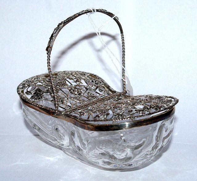 Appraisal: AN EDWARDIAN SILVER MOUNTED GLASS DOUBLE LIDDED SWEETMEAT BASKET with