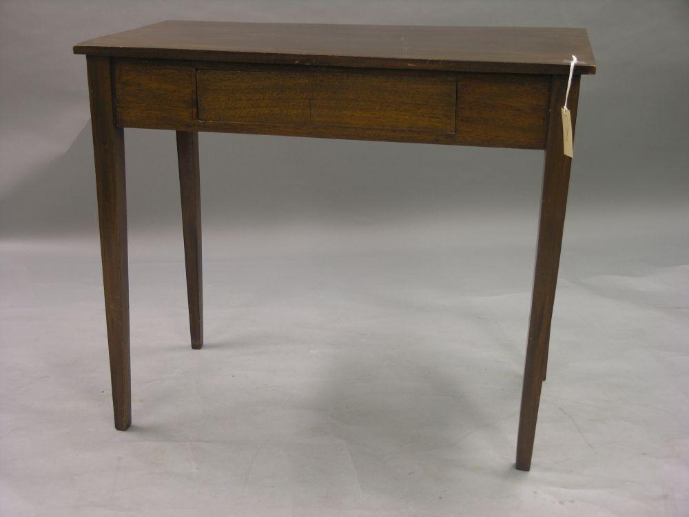 Appraisal: A mahogany side table with single frieze drawer on square