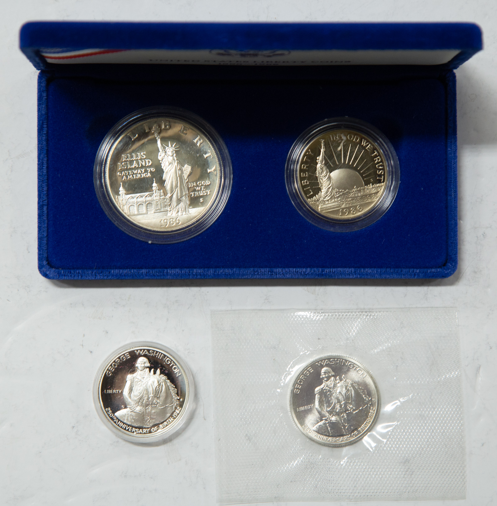 Appraisal: LIBERTY SET TWO WASHINGTON PROOF HALVES coin Liberty proof set