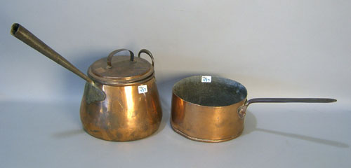 Appraisal: Two copper kettles th c with iron handles h and