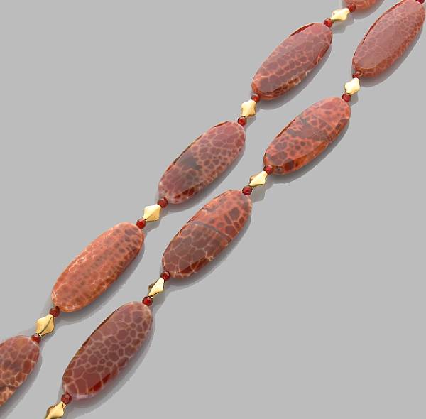 Appraisal: Fire Agate Necklace A continuous rope-length necklace formed of semi-translucent