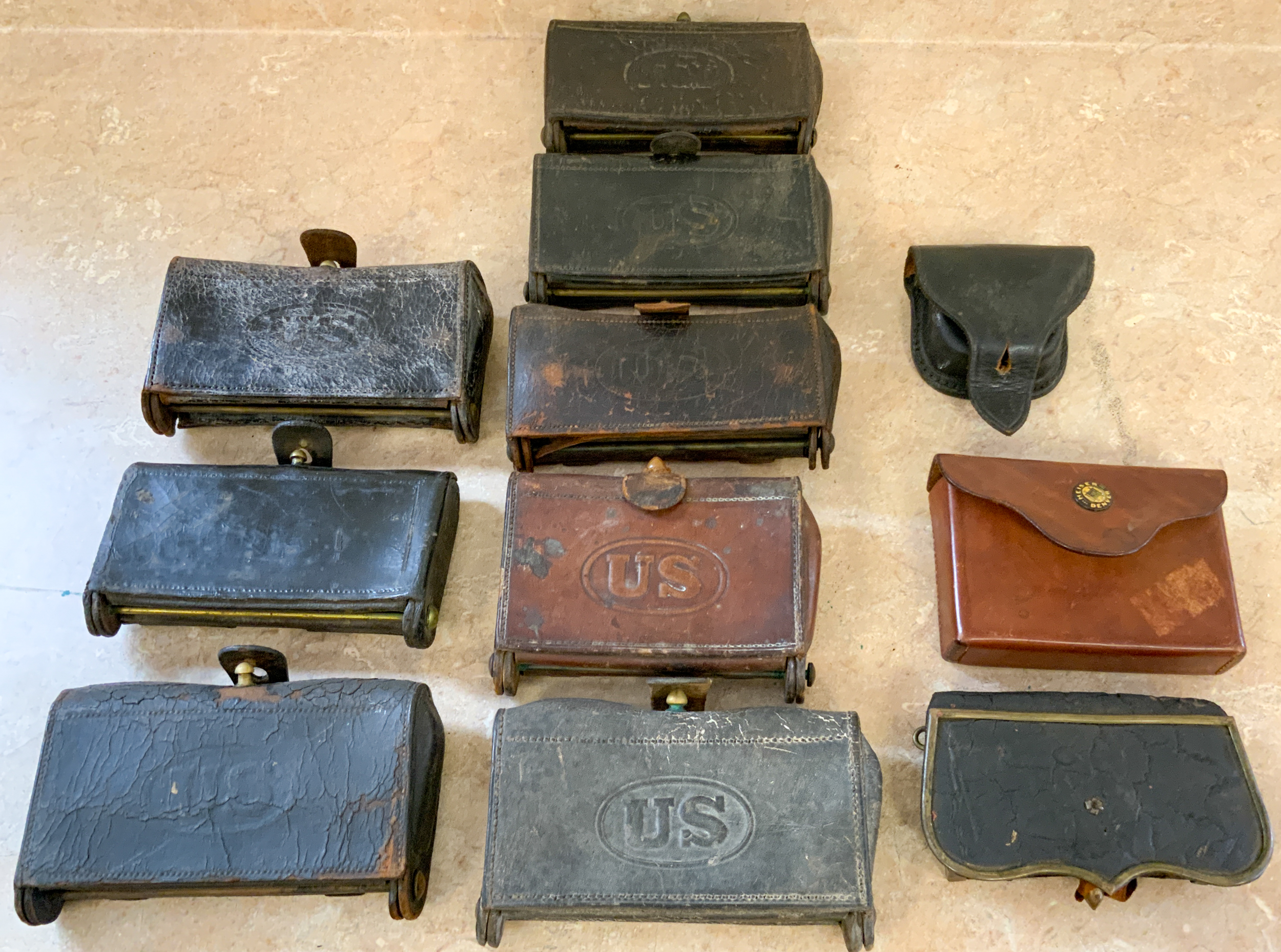 Appraisal: LEATHER AMMO POUCHES Leather Ammo Pouches