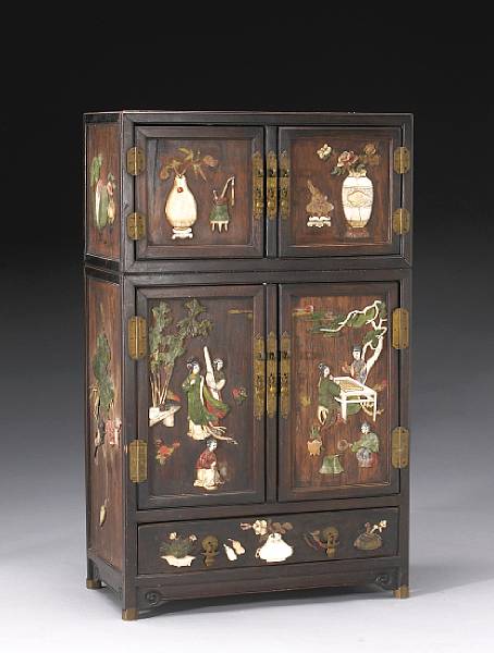 Appraisal: A small hardwood table cabinet with ivory and colored stone