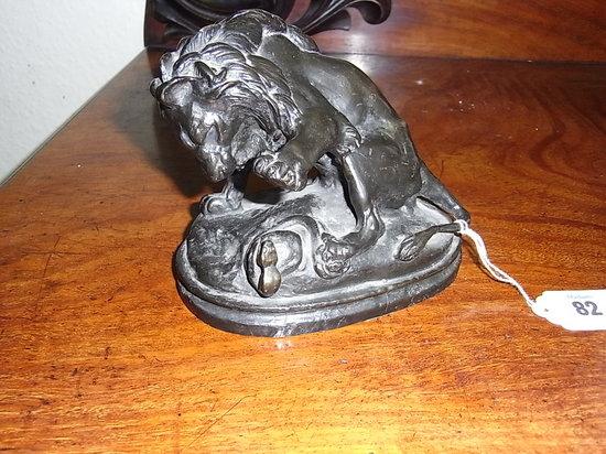 Appraisal: AFTER ALFRED BARYEA bronze sculpture of a lion fighting a