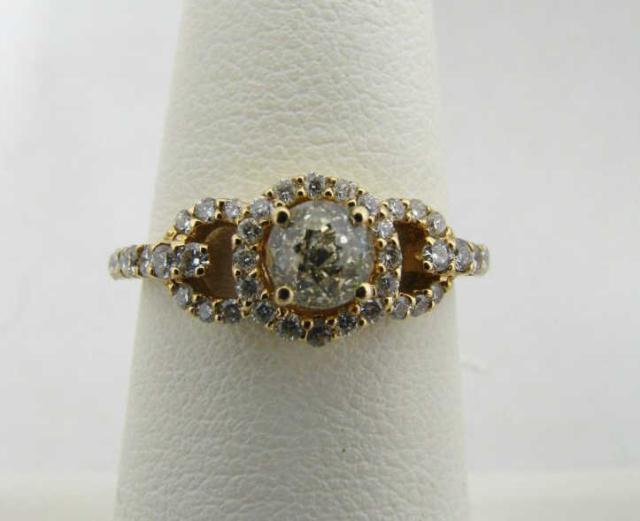 Appraisal: k yellow gold faceted old mine cut center diamond ring