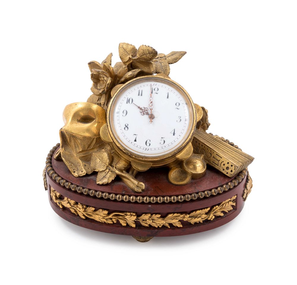 Appraisal: A Louis XV Style Gilt Bronze and Marble Table Clock