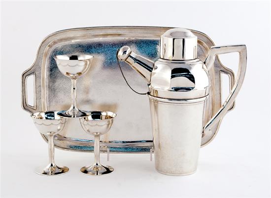 Appraisal: Japanese silver martini set mid th century stipple-decorated design marked