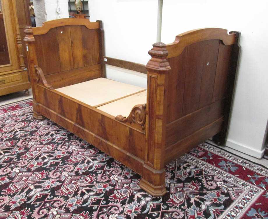 Appraisal: EMPIRE MAHOGANY DAYBED French early th century H x W