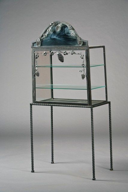 Appraisal: A French Art Deco wrought iron display cabinet on a