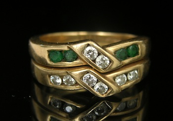 Appraisal: Double Ring with Emeralds and Diamonds k yellow gold double