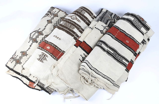 Appraisal: A COLLECTION OF FOUR FULANI TRIBE WEDDING BLANKETS with symbolic