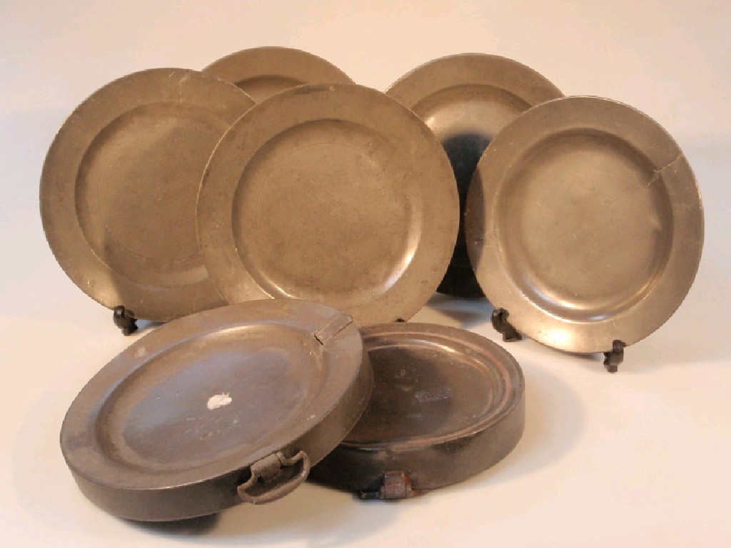 Appraisal: thC and later pewter dinner plates and warming stands