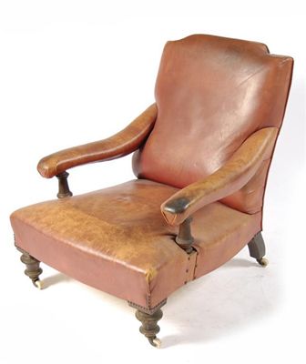 Appraisal: A Victorian low easy open armchair upholstered in burgundy leather