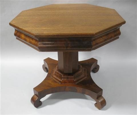 Appraisal: EMPIRE MAHOGANY OCTAGONAL CENTER TABLE Raised on a conforming pedestal