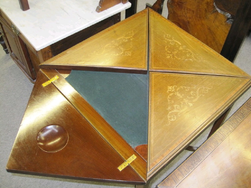 Appraisal: Edwardian mahogany envelope card table with inlaid top with drawer