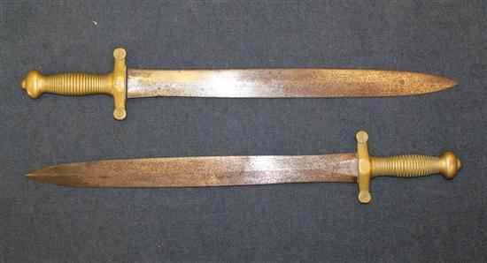 Appraisal: Two pattern French short swords with brass hilts ins Estimate