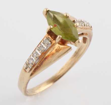 Appraisal: K one marquise peridot ten round diamonds ct size gold