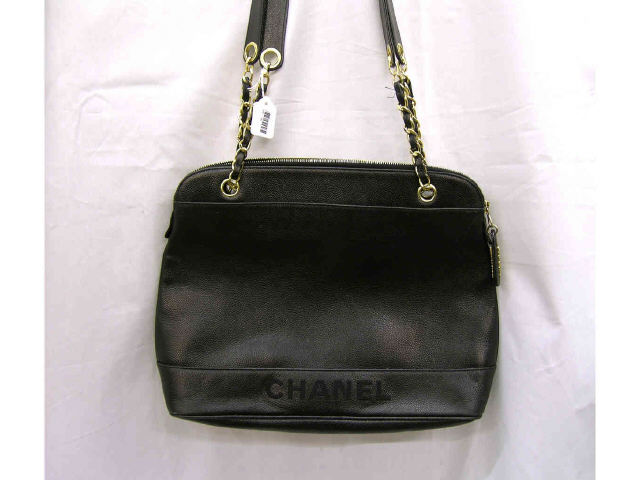 Appraisal: Chanel zipper handbag black leather with chain and leather strap