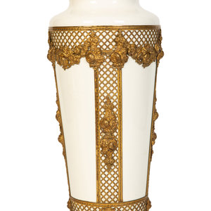 Appraisal: A Continental Gilt Metal Mounted Porcelain Vase th Century Height