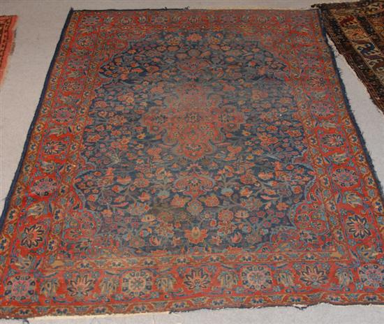 Appraisal: An Antique Sarouk Rug Worn ' x '