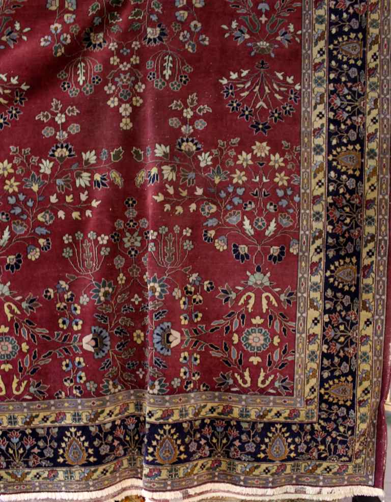 Appraisal: LARGE PERSIAN MASHAD RUG red ground with multi-colors approx '