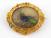 Appraisal: An antique carat gold mourning brooch with plaited hair compartment