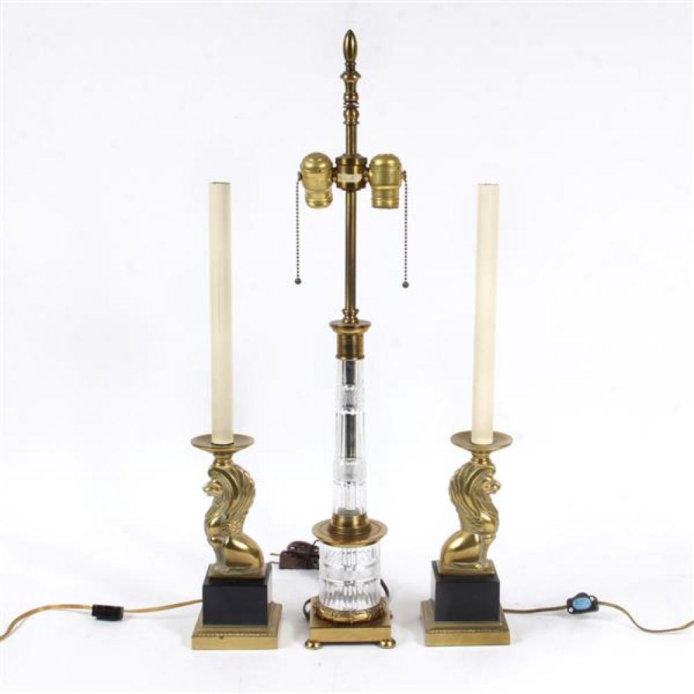 Appraisal: PAIR OF CANDLESTICK LAMPS WITH BRASS LION FIGURES ON A