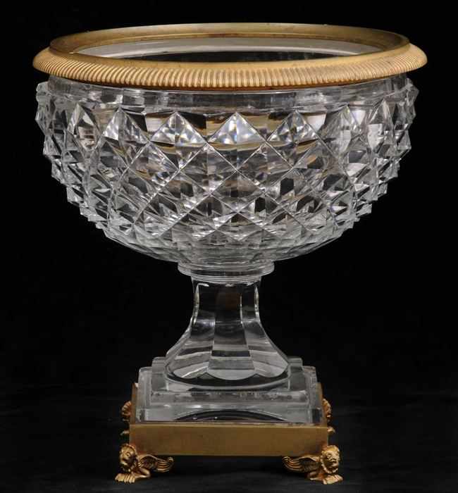 Appraisal: REGENCY-STYLE GILT-METAL MOUNTED CUT-GLASS STEMMED BOWL The diamond-faceted hemispherical bowl