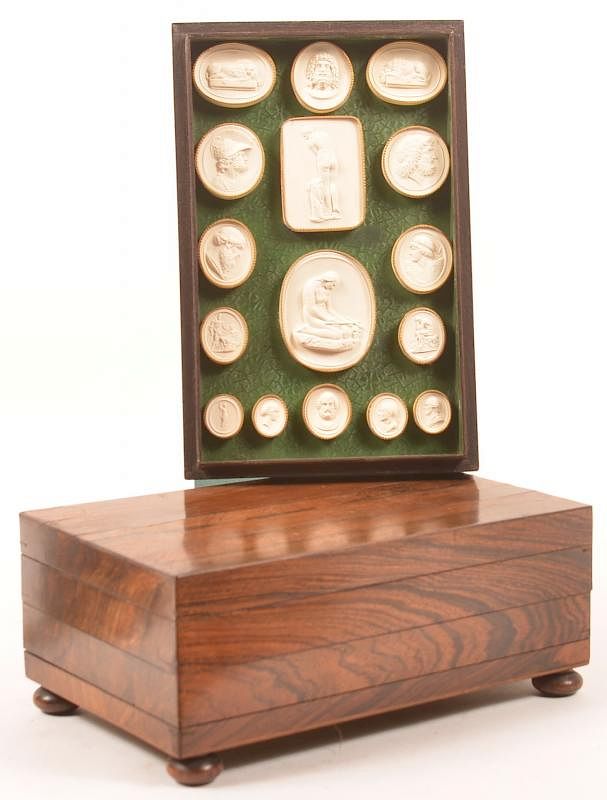 Appraisal: Rosewood Box Enclosing Plaster Medallions th Century Rosewood Box Enclosing