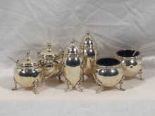 Appraisal: A silver condiment set comprising two each pepper salt and