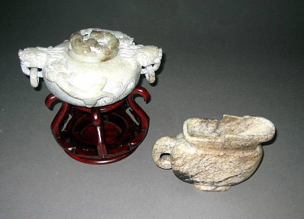 Appraisal: Two nephrite jade archaistic vessels The first a mottled black