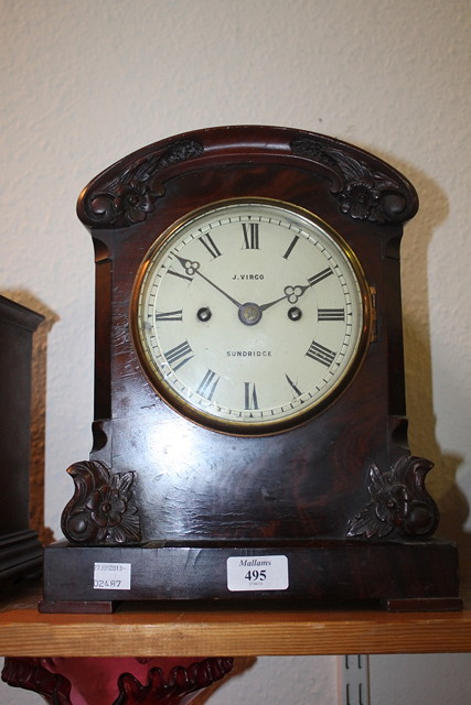 Appraisal: A TH CENTURY MAHOGANY BRACKET CLOCK with stylised carved case