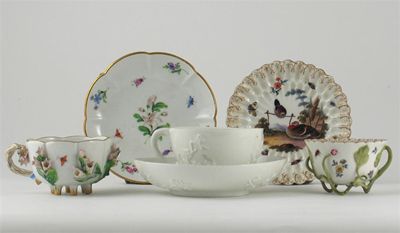 Appraisal: Two Meissen teacups and saucers one applied with prunus the