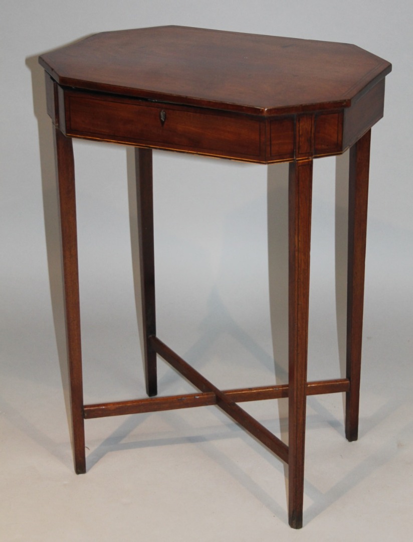 Appraisal: A thC mahogany side table the octagonal top with a