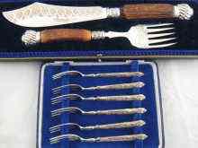 Appraisal: A boxed set of six silver handled pastry forks and