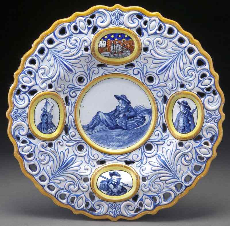 Appraisal: Porquier-Beau Quimper pottery platehaving raised and reticulated decoration in blue