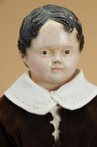 Appraisal: Early Papier Mache Boy Doll Germany ca finely molded papier