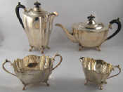 Appraisal: A four piece silver teaset of fluted shaped oval form