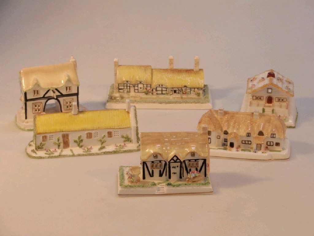 Appraisal: Six Coalport reproduction pastille burners modelled as buildings including Robert