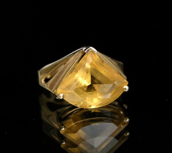 Appraisal: A Fan Shape Golden Topaz Ring k yellow gold mounting