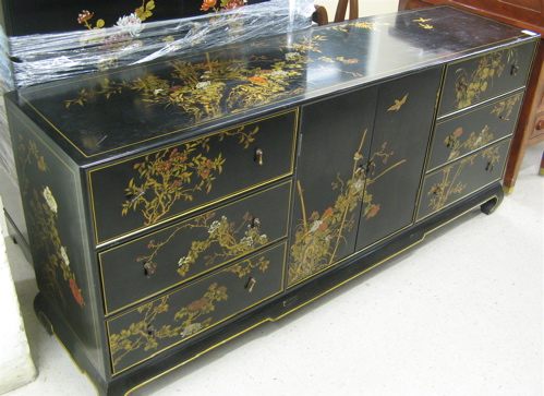 Appraisal: FLORAL DECORATED BLACK LACQUER BUREAU Chinese contemporary the front featuring