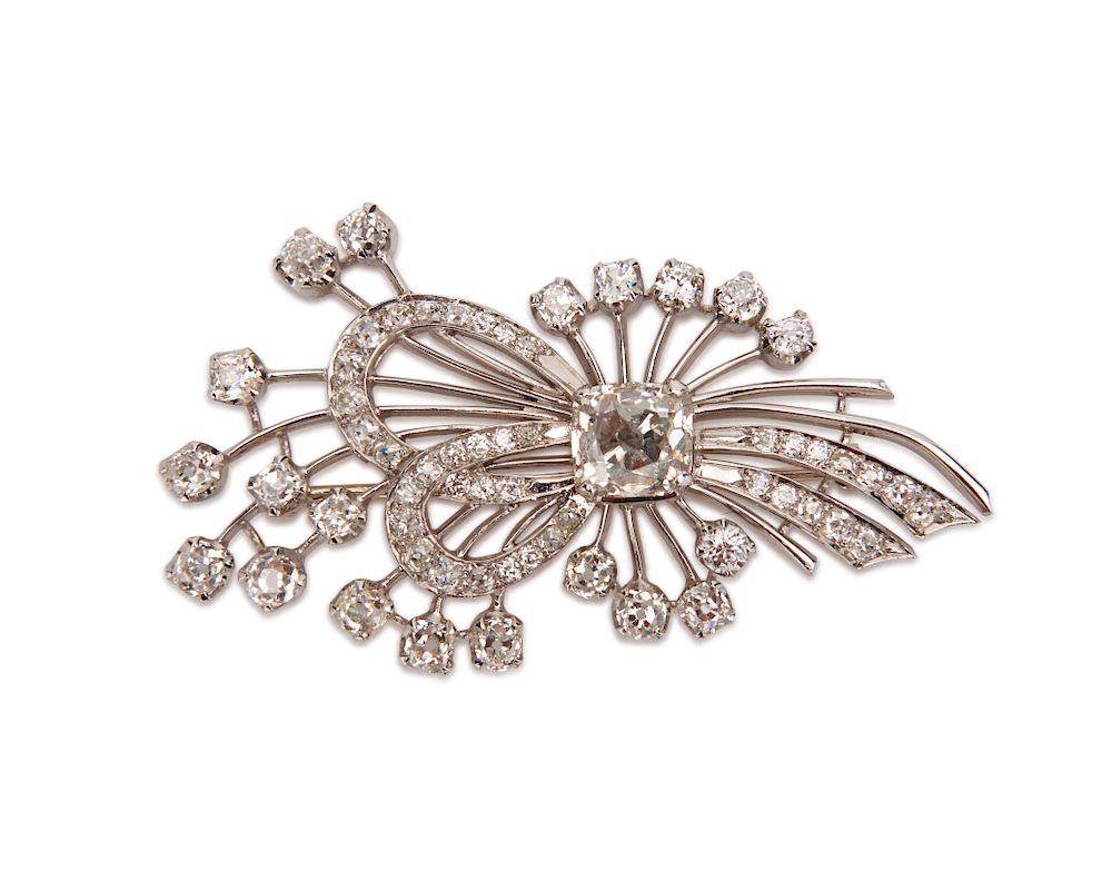 Appraisal: Platinum and Diamond Brooch Platinum and Diamond Brooch centering a