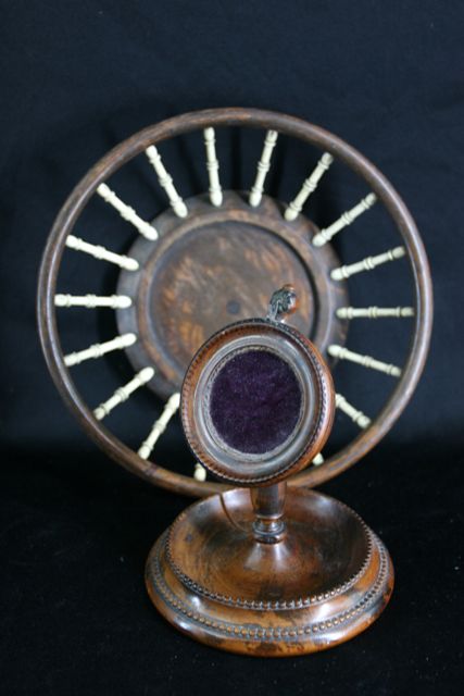 Appraisal: A watch stand and pierced base in wood and bone