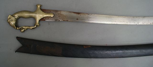 Appraisal: An Indian Tulwar inch plain blade with some rust cast