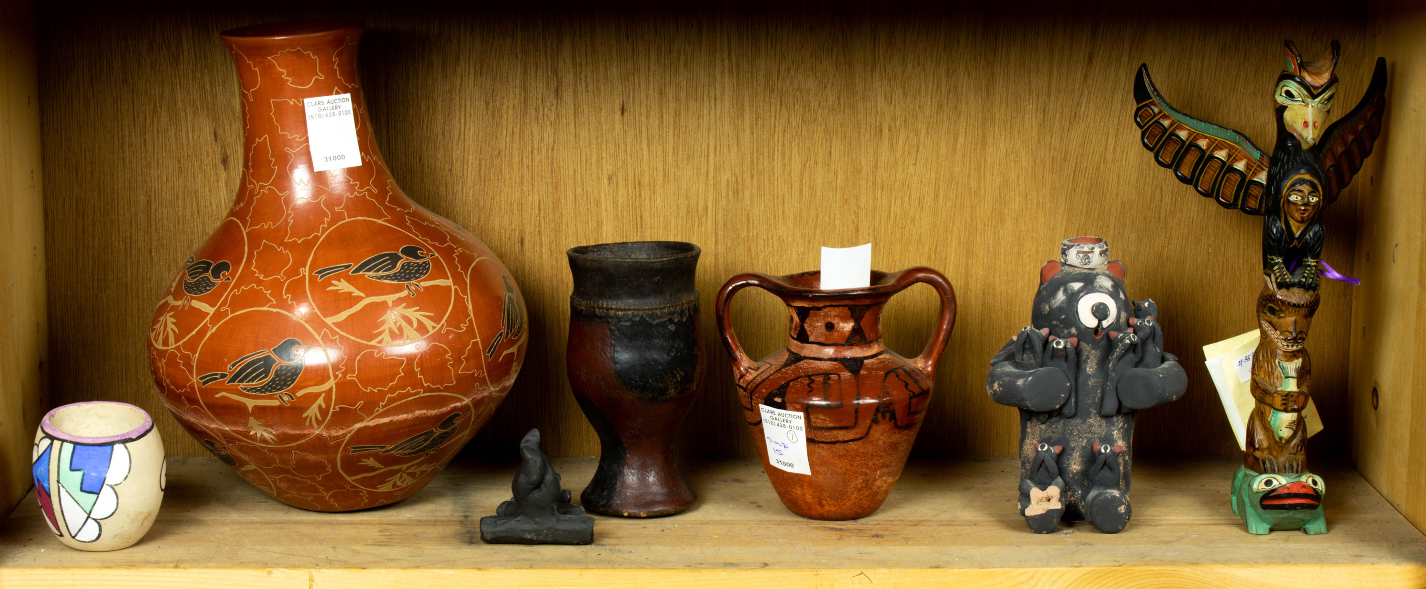 Appraisal: ONE SHELF OF MOSTLY POTTERY INCLUDING A SMALL VASE SIGNED