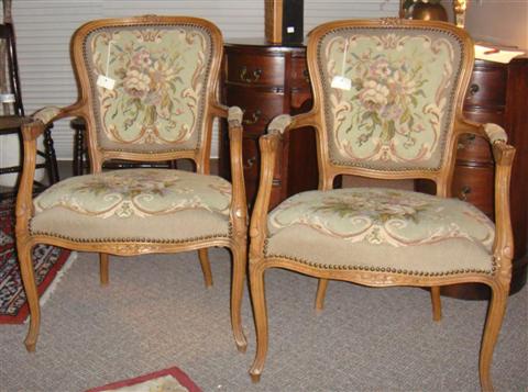 Appraisal: PAIR OF LOUIS XV STYLE FRUITWOOD AND NEEDLEPOINT ARM CHAIRS