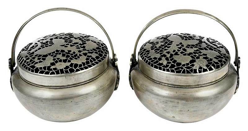 Appraisal: Pair of Chinese Handwarmers Qing dynasty round with swing handle